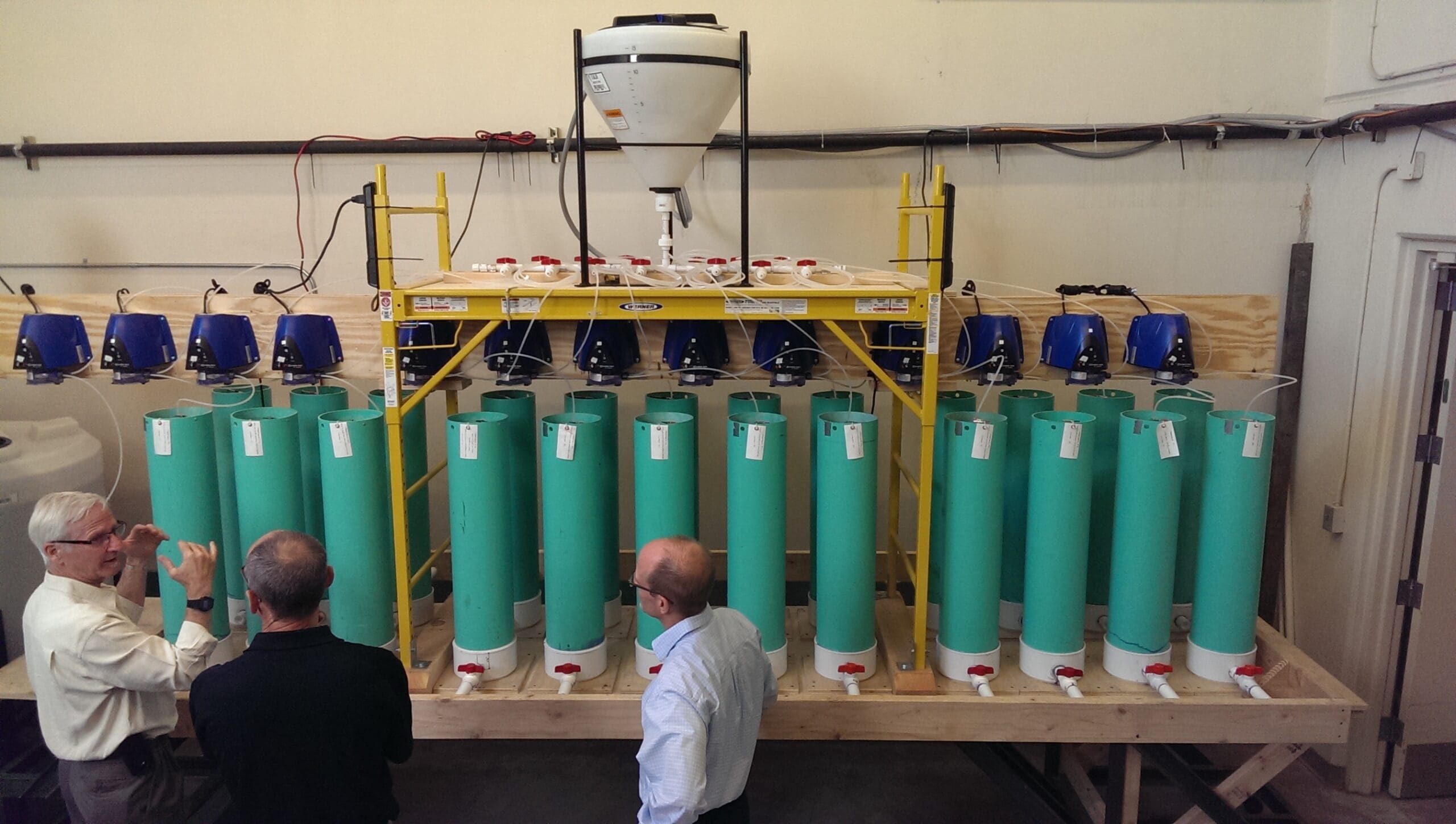 Project Manager Curtis Hinman, explains the test column array to colleagues at Seattle University.